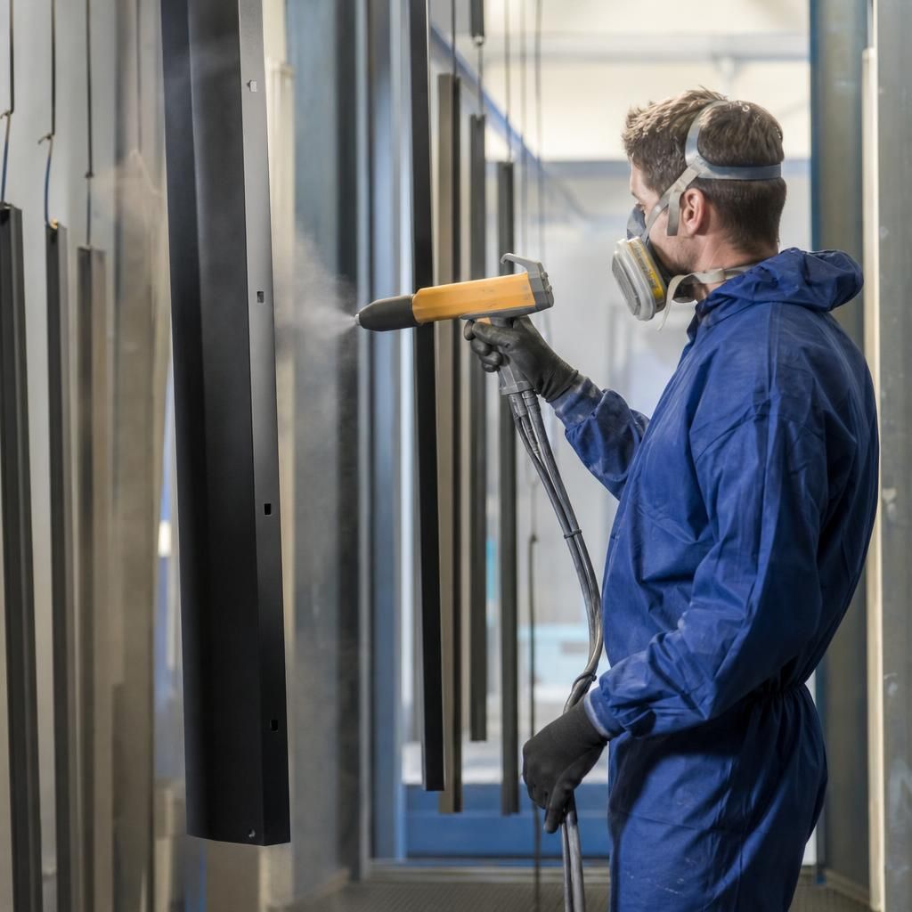 Powder coating facility featuring advanced spray equipment